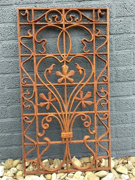 Grote foto cast iron deur raam rooster wandornament mooi smeedwerk stuk. tuin en terras hekken en schuttingen